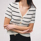 Cardigan a righe in maglia con bottoni dorati
