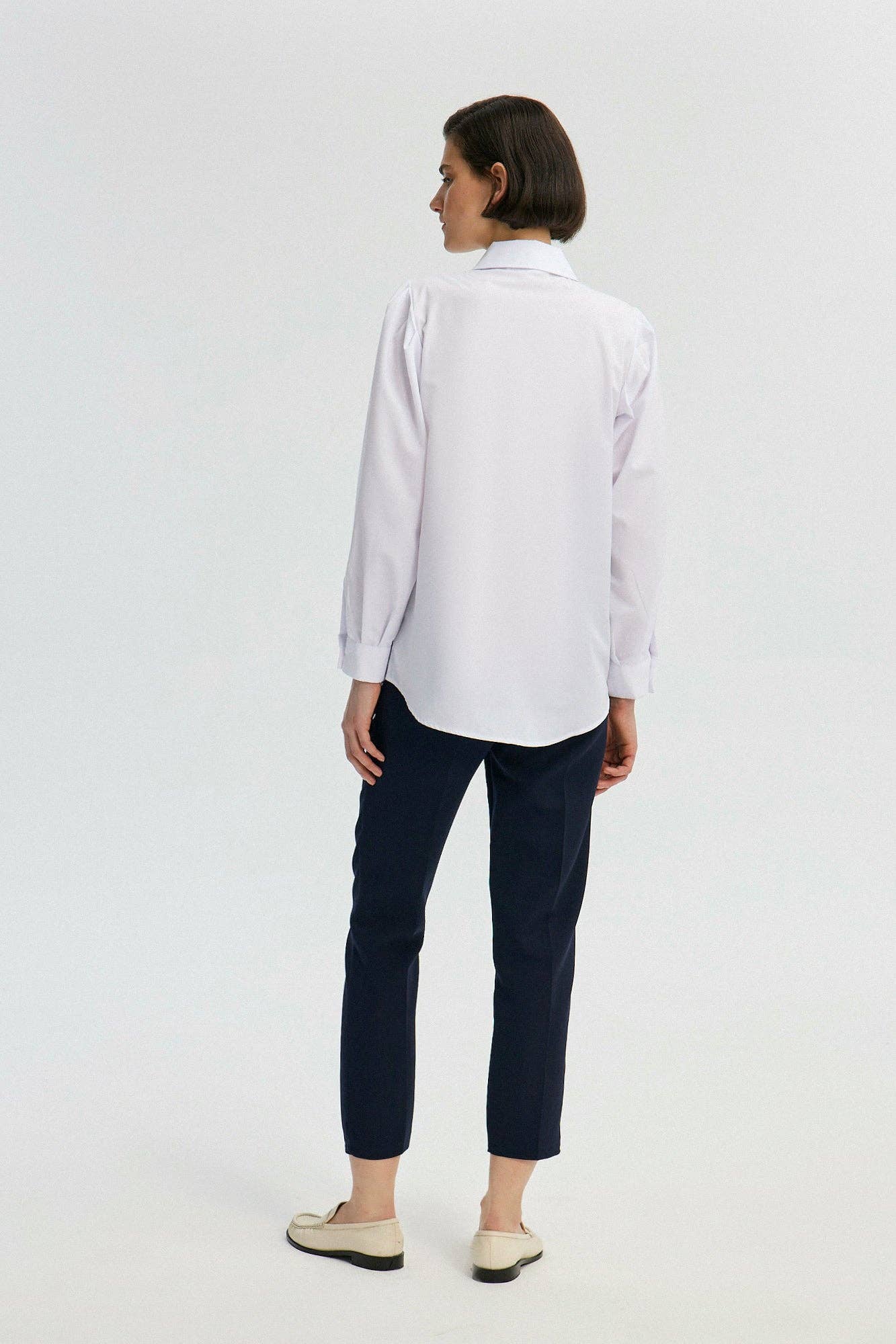 Camicia bianca con maniche plissettate