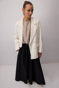 Giacca in tweed con frange