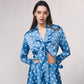 Blusa satinata a pois con fiocco