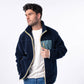 Giacca sherpa unisex con zip bicolore blu navy e verde