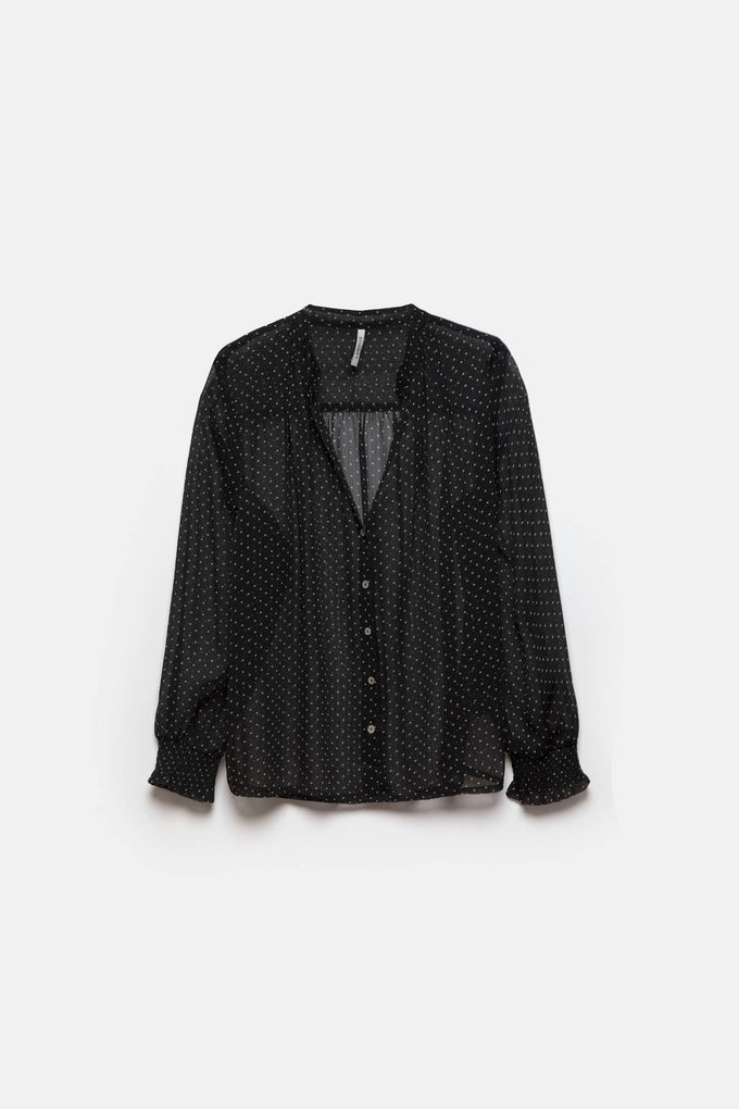 Blusa a pois semitrasparente con scollo a V