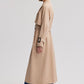 Trench oversize beige con cintura e fibbie