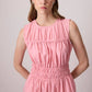 Abito lungo rosa in popeline a balze con smock