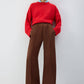 Pantaloni palazzo a pieghe con vita elasticizzata