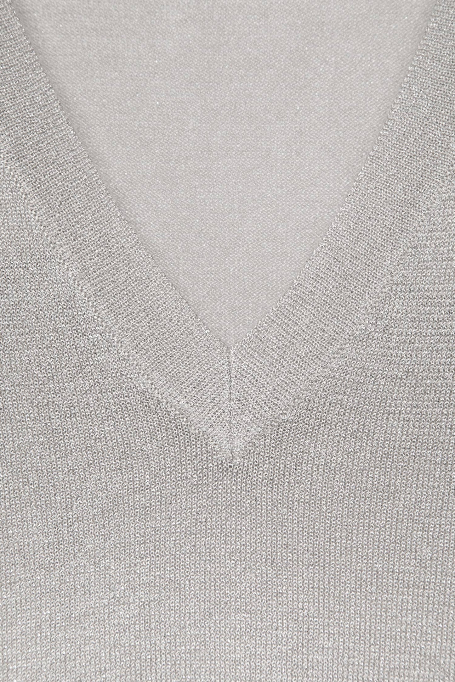Maglione a maglia rasata con dettagli metallici