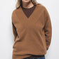 Maglione in lana a tinta unita con scollo a V