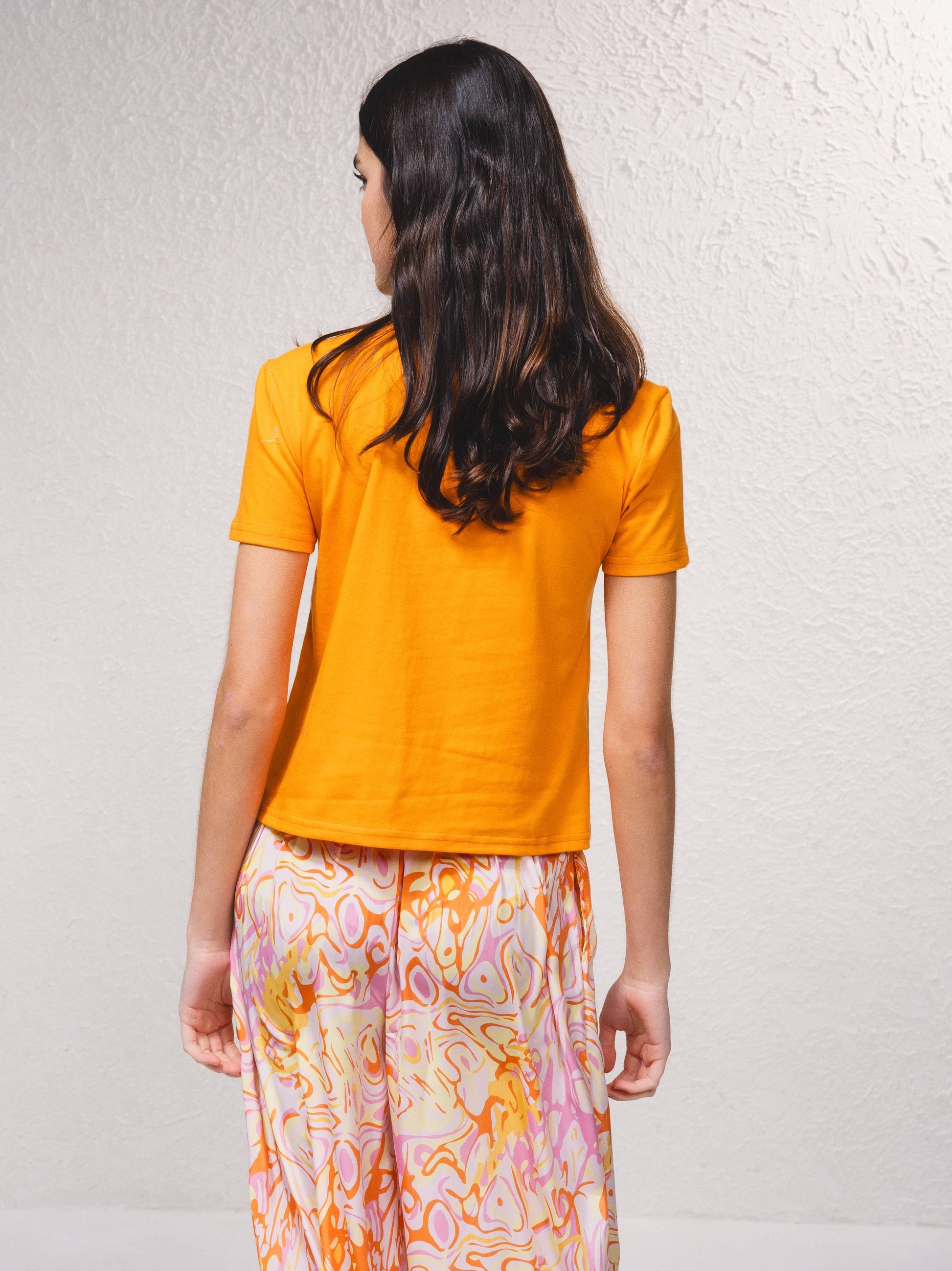 T-shirt in cotone con applicazioni di perline