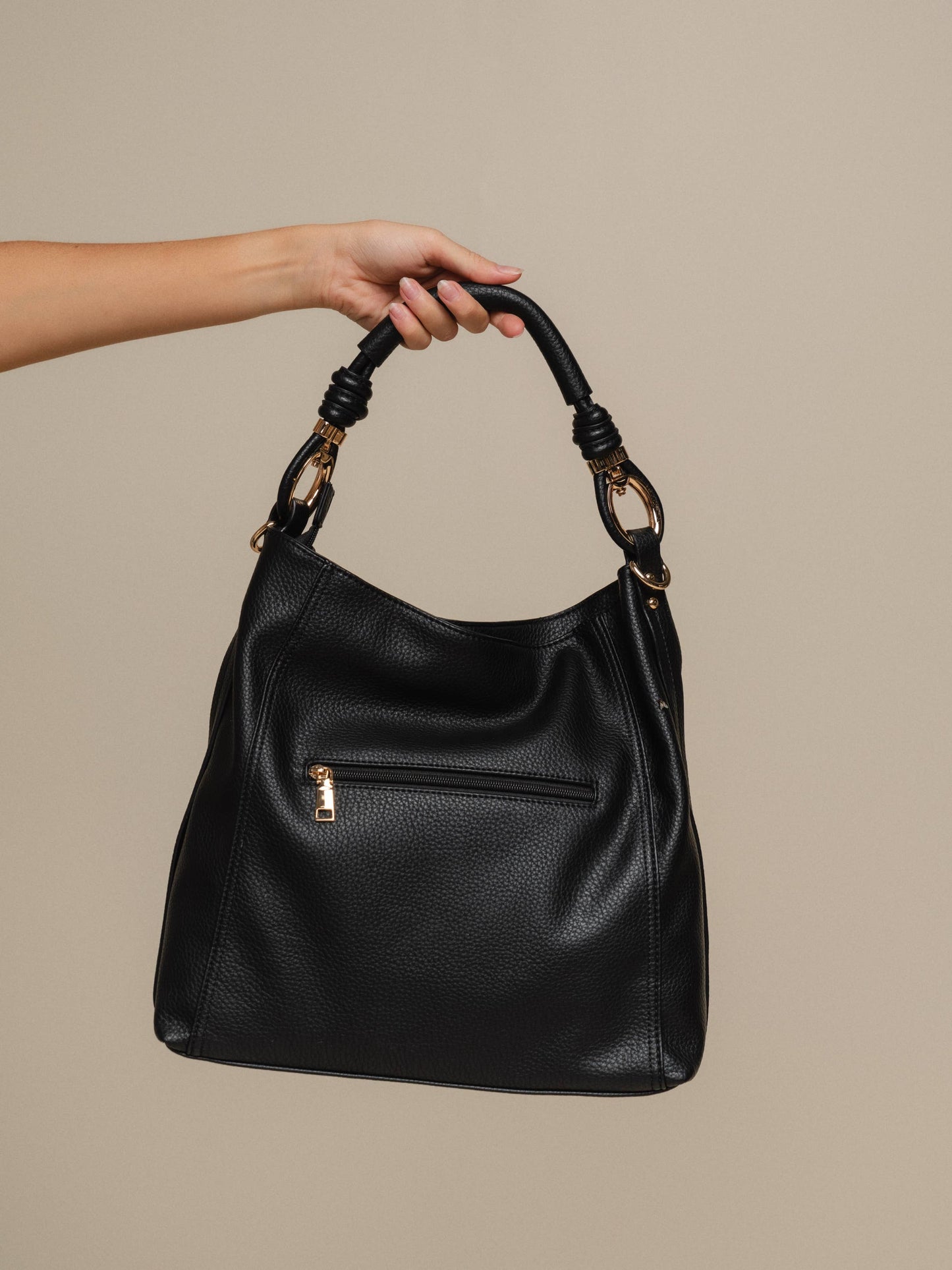 Borsa hobo in ecopelle con manico intrecciato