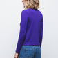 Maglione in maglia rasata con fiocco e scollo a V