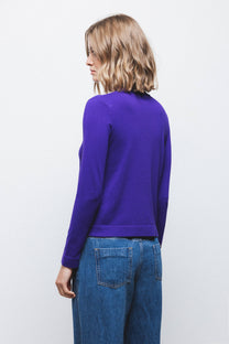 Maglione in maglia rasata con fiocco e scollo a V