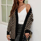 Cardigan smanicato in maglia color vino