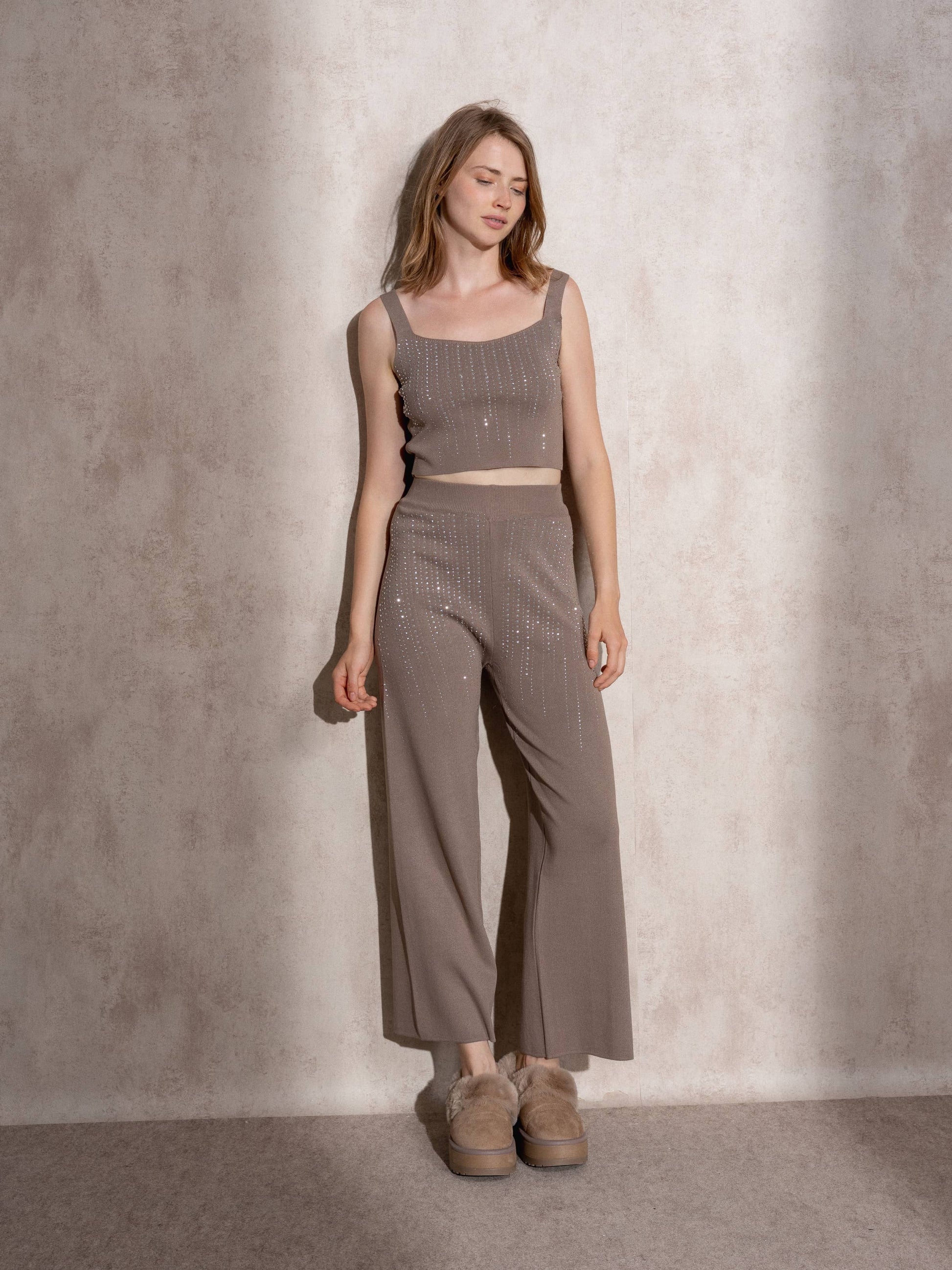 Pantaloni a vita alta in maglia con glitter