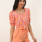 Crop top Tara con stampa multicolor