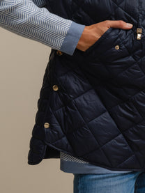 Capa donna trapuntata in nylon con cappuccio