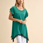 Tunica in maglia elasticizzata relaxed fit con frange