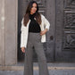Pantaloni in maglia pied-de-poule a gamba ampia
