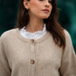 Cardigan in maglia beige con bottoni