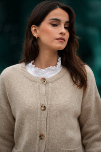 Cardigan in maglia beige con bottoni