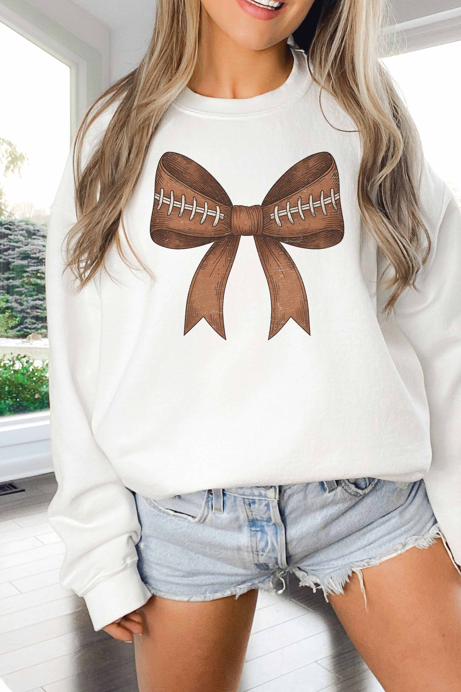 Felpa oversize con stampa fiocco football