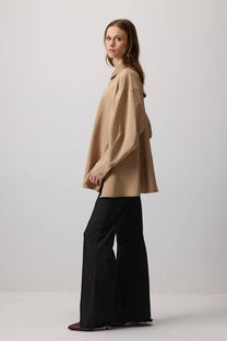 Camicia oversize abbottonata in effetto cupro