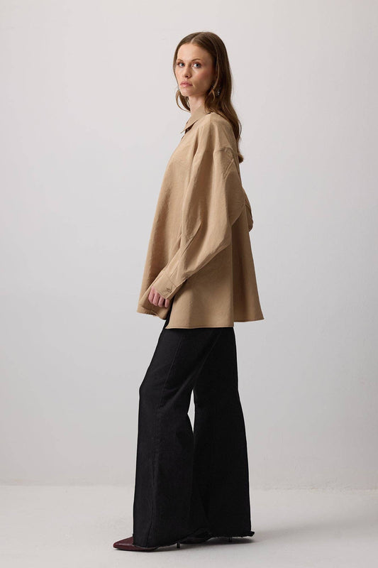 Camicia oversize abbottonata in effetto cupro