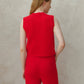 Top smanicato in misto cashmere con scollo a V