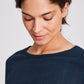 Top Thyra a maniche lunghe in cotone biologico a costine blu denim