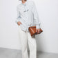 Camicia a righe con fiocco al collo