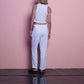 Pantaloni a vita alta color perla con bottoni dorati