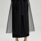 Gonna nera in organza trasparente con tasche utility