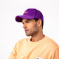 Cappellino in velluto viola con logo ricamato