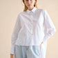 Camicia asimmetrica in cotone bianco