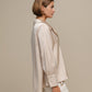Tunica satinata oversize con bottoni