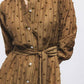 Abito camicia fantasia con maniche a palloncino e cintura a fiocco