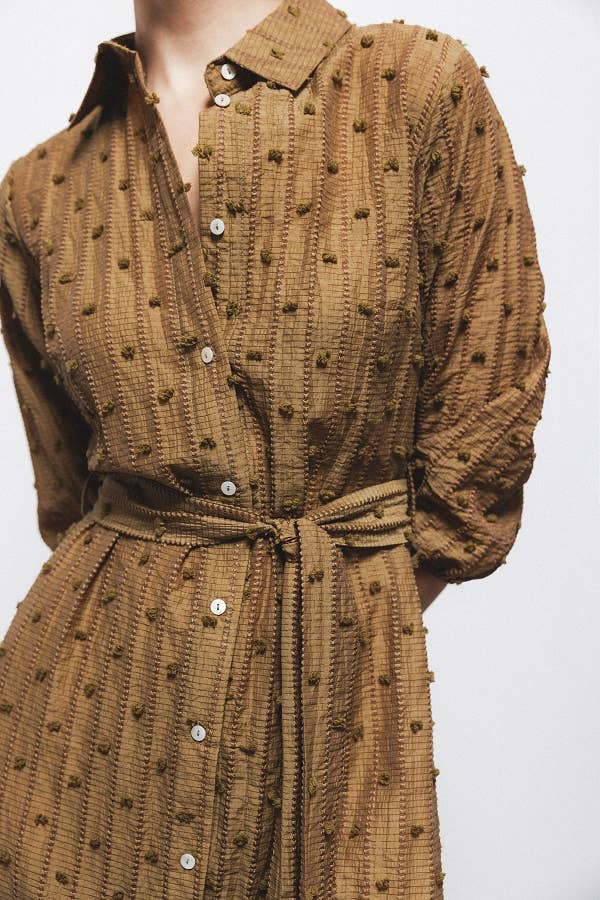 Abito camicia fantasia con maniche a palloncino e cintura a fiocco