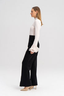 Pantaloni a vita alta in jersey con spacchi frontali