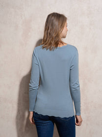 Maglia in maglia girocollo con bottoni dorati