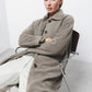 Cappotto lungo fantasia con maniche raglan