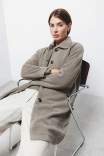 Cappotto lungo fantasia con maniche raglan