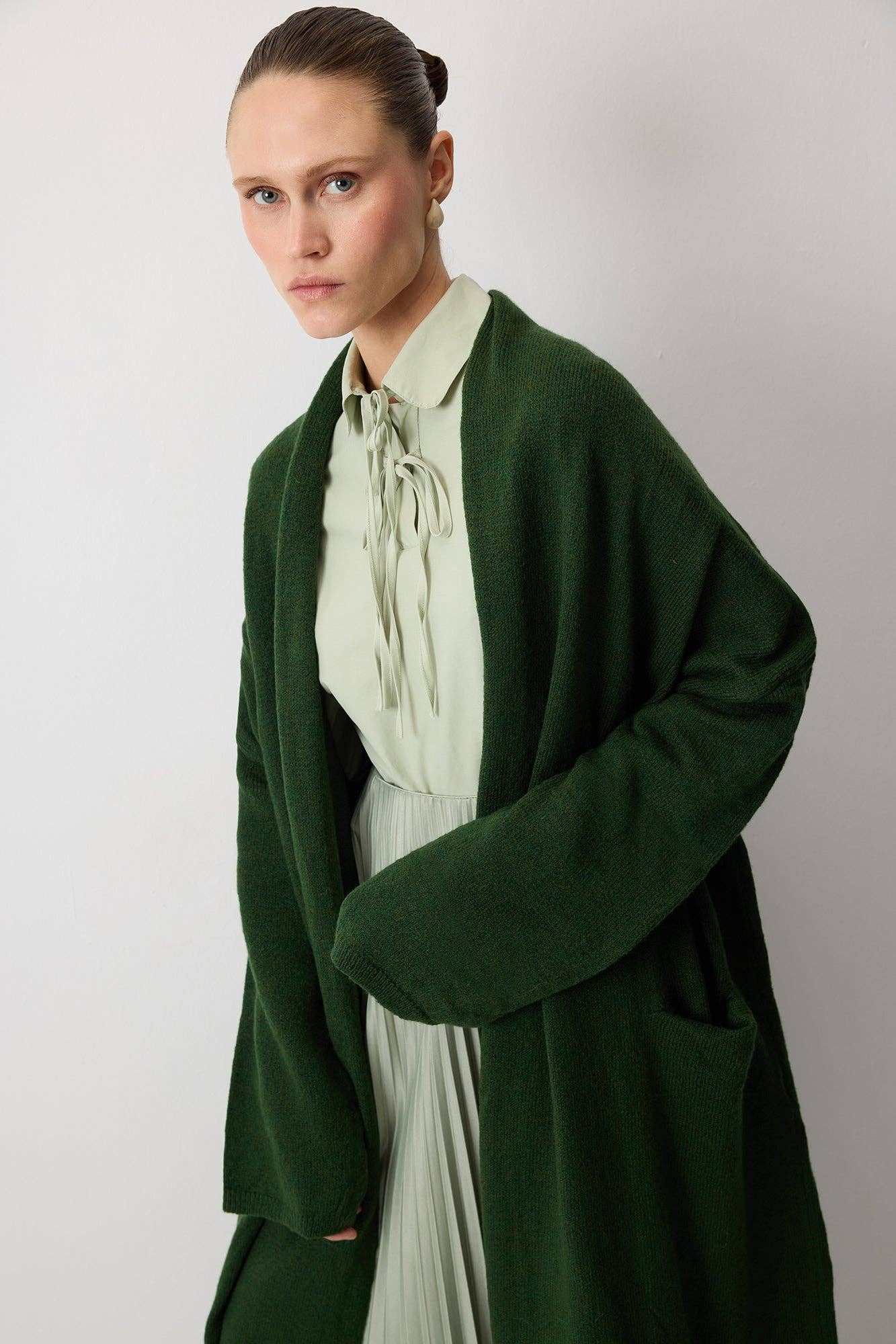Cardigan oversize in maglia con tasche