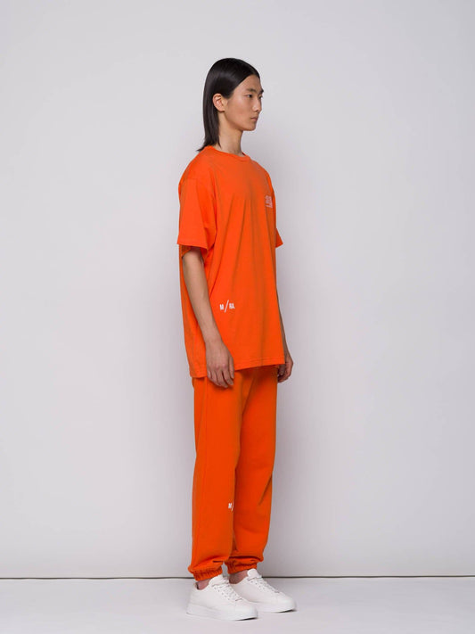 T-shirt arancione con logo