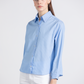 Camicia a righe in cotone azzurra