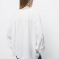 Blusa con pieghe sulle maniche