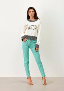 Maglia in cotone con paillettes e scritta