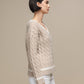 Maglione donna a trecce con scollo a V