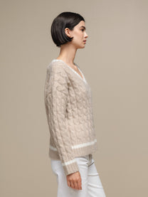 Maglione donna a trecce con scollo a V