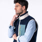 Gilet sherpa unisex con zip bicolor blu navy e verde
