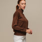 Maglione polo in maglia con zip e micro strass