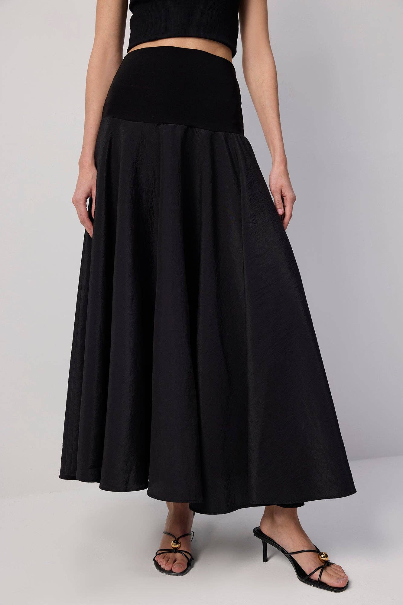 Gonna maxi a campana effetto cupro con vita a corsetto